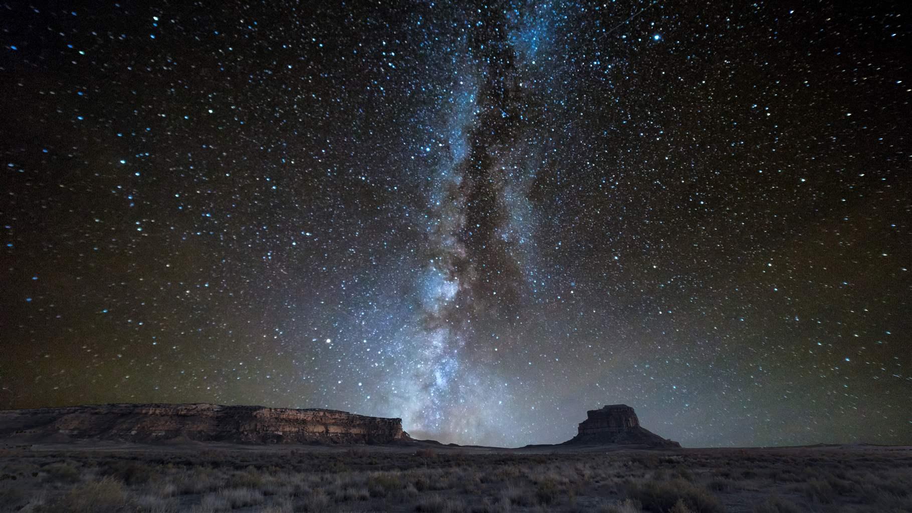 The Milky Way galaxy sets over Fajada Mesa at Chaco Canyon, New Mexico